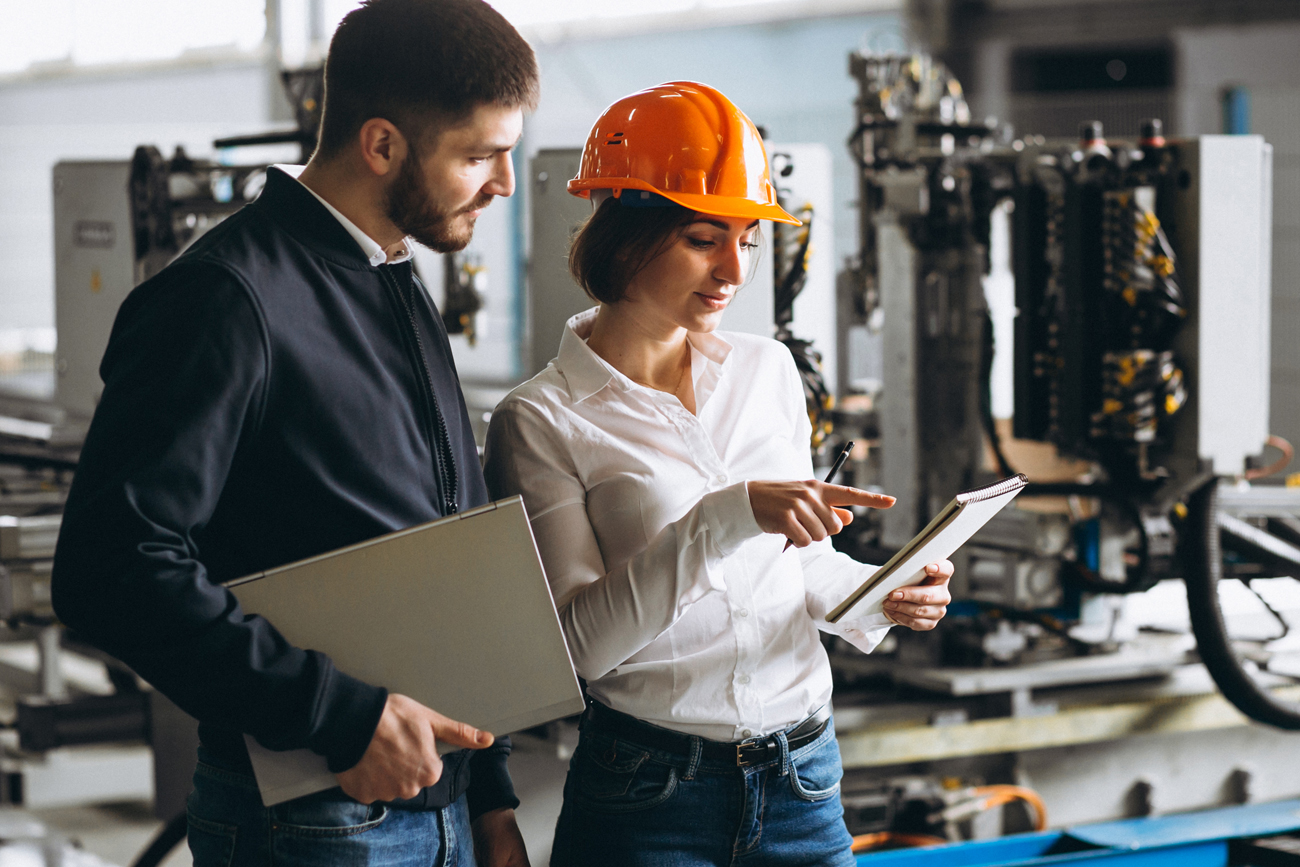 Automotive employees using Pronto Xi to manage shop floor processes.