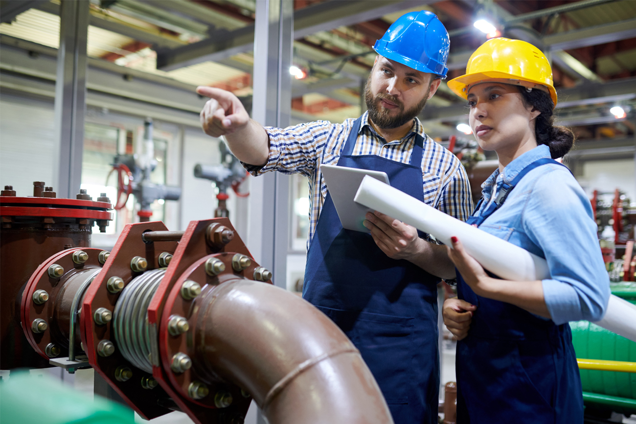 Staff maintaining and analysing HVAC equipment.