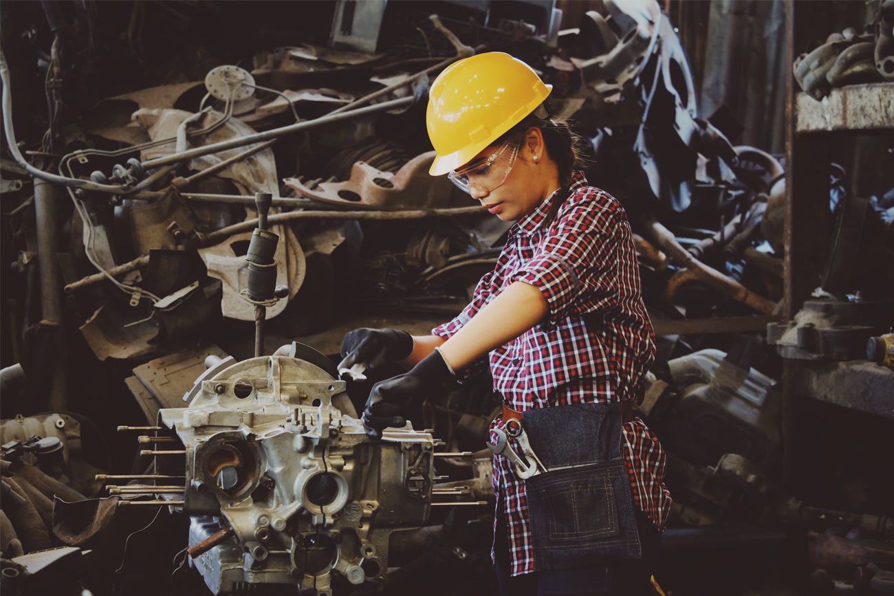 Worker using automation to manage production.