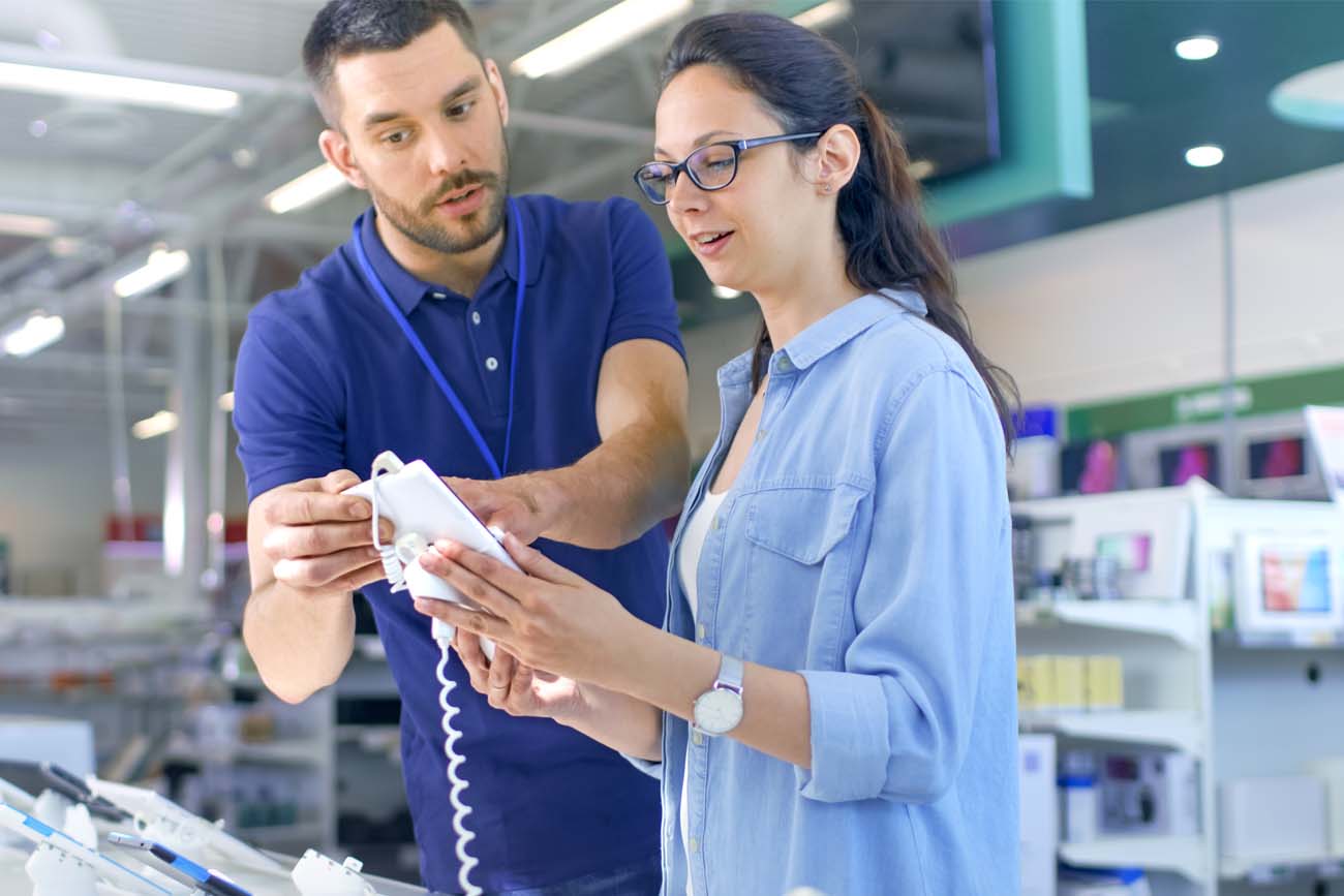 Office supplies worker ensuring customer satisfaction by delivering quality customer service.