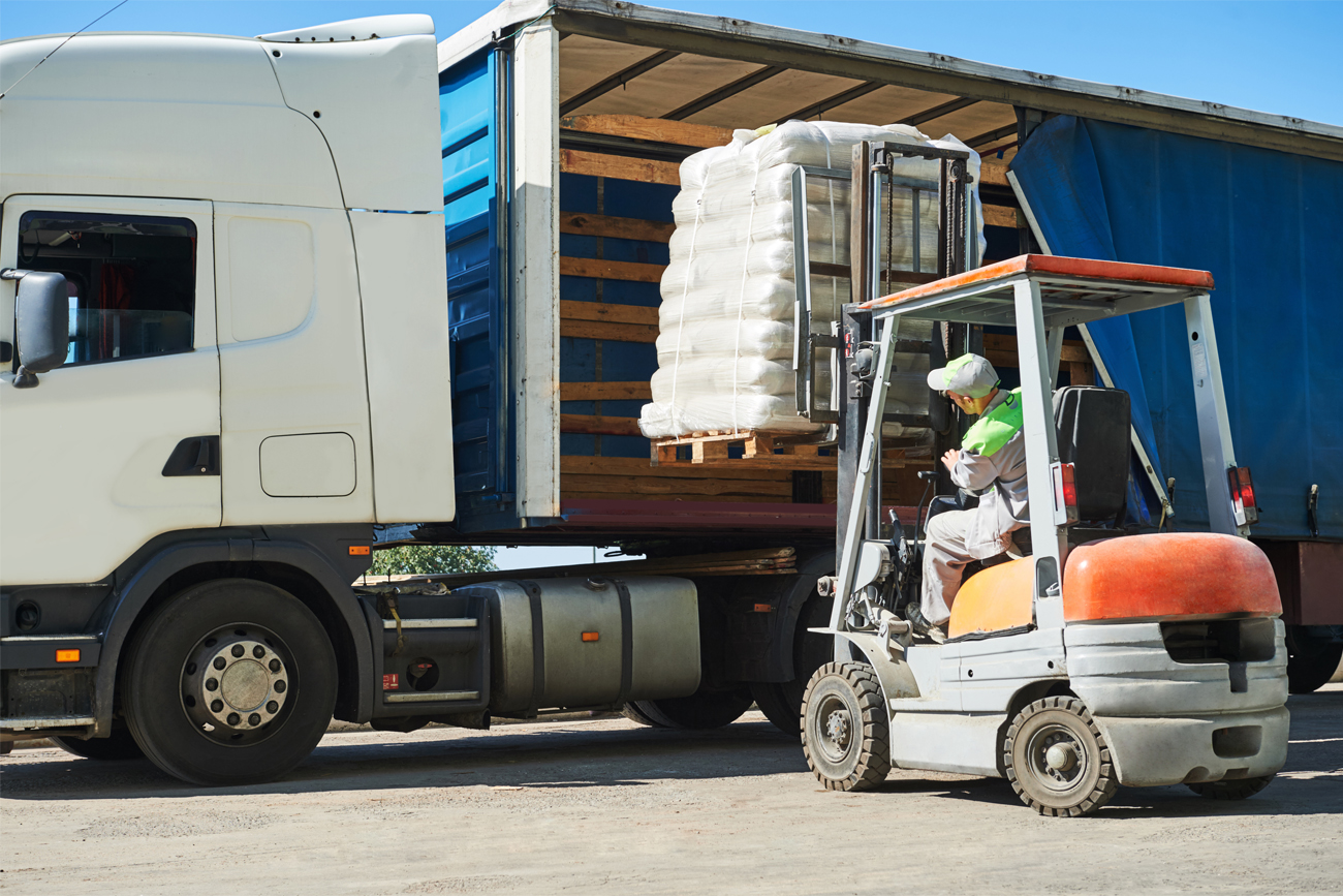 Transporting delivered goods using the relevant machinery to speed up delivery times.