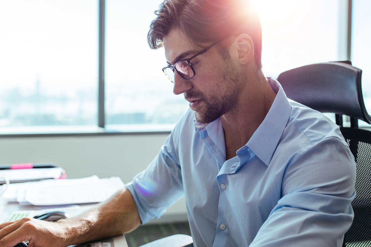 Workers managing day to day business operations using Pronto Xii ERP Solution.
